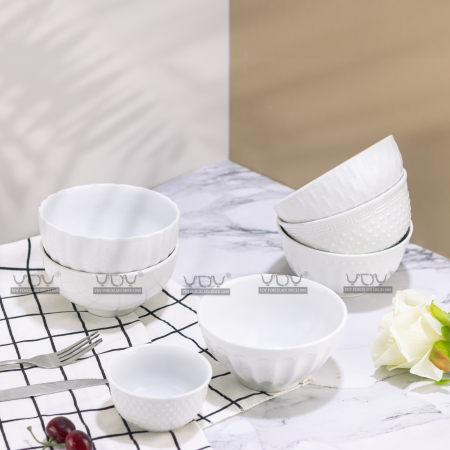 white embossed bowls