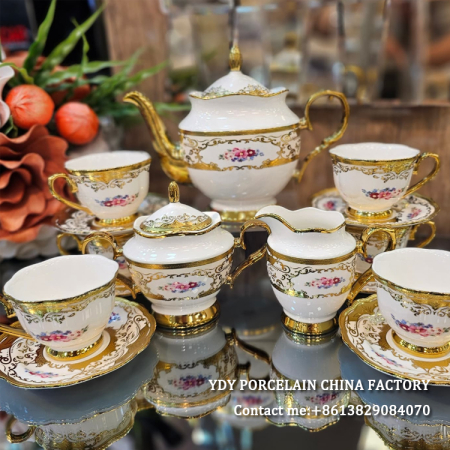 gold and white tea set